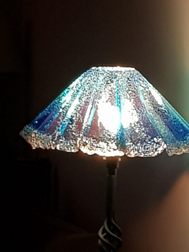 Blue Resin Lampshade Design Colorful resin lampshade emitting warm glow